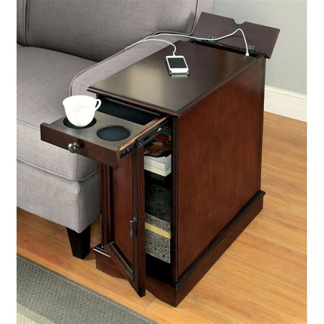 This steel-framed table doubles as a desk, with a liftable top that can reach up to 31. . Side table with charging station